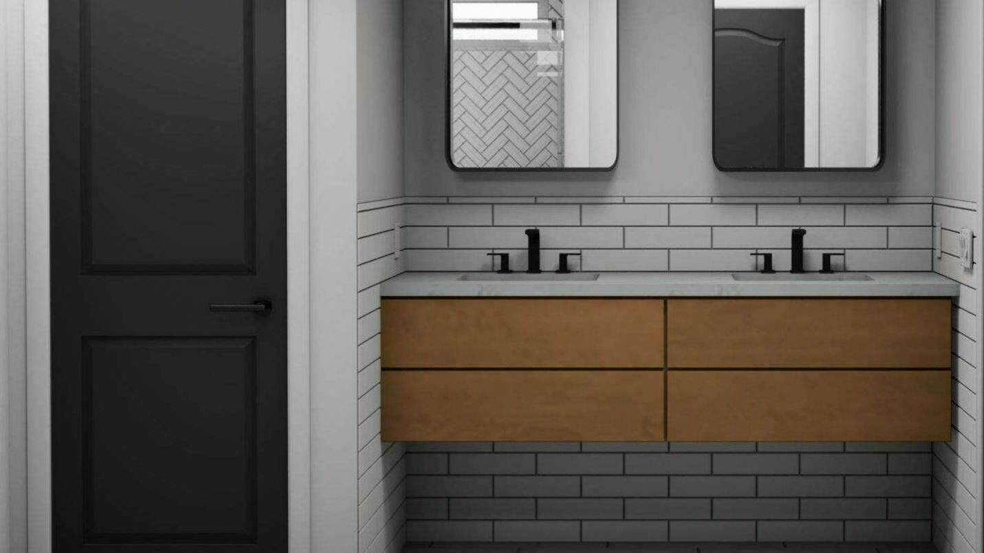 A bathroom backsplash features white subway tiles